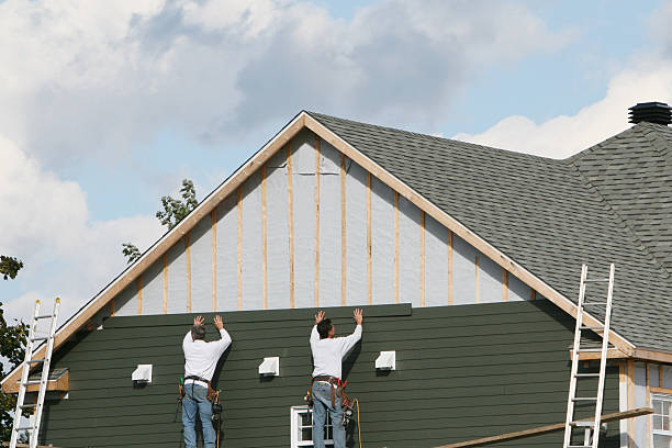 Professional Emergency Siding Repair technician working in Columbia Station, OH